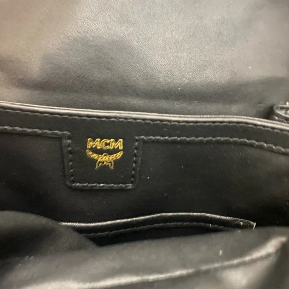MCM small Cognac back pack with storage bag.